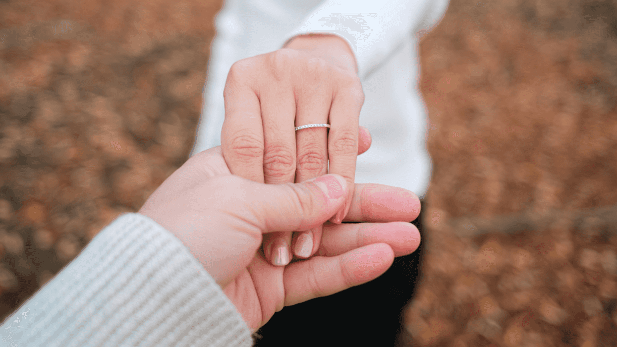 Woman wearing a ring on her ring finger