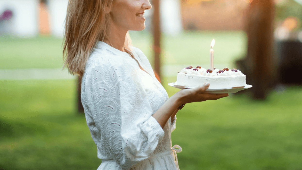 Woman wearing a white dress for her birthday party