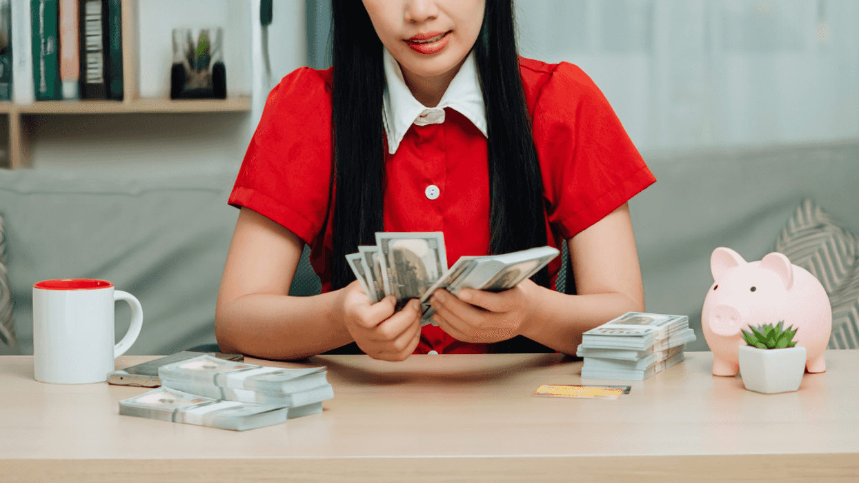 woman with a lot of money