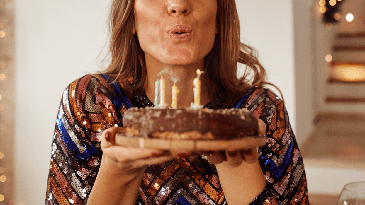 Woman with birthday cake