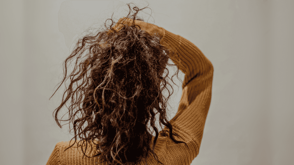 woman with long curly hair