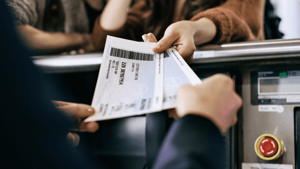 Woman with plane tickets