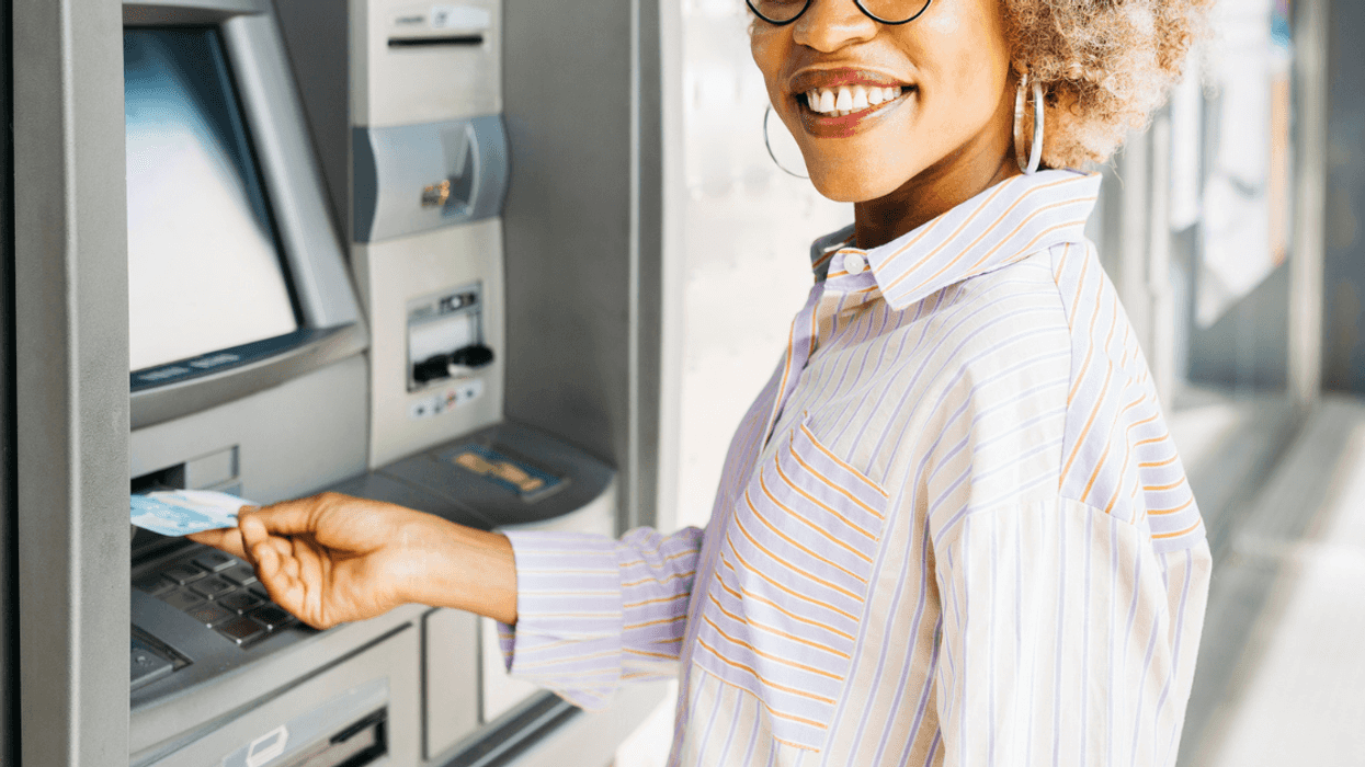 Woman withdrawing money at ATM