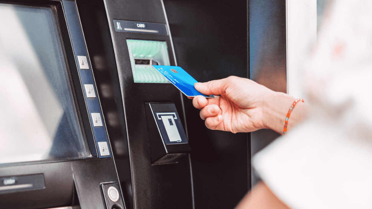 Woman withdrawing money at ATM