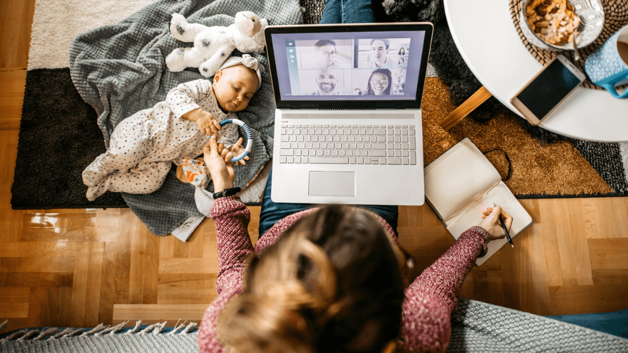 Woman working from home with a baby
