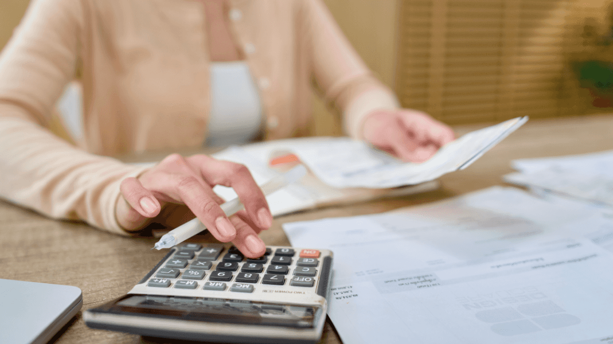 woman working on calculator