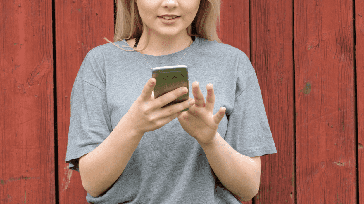 Women wearing tshirt while using the phone