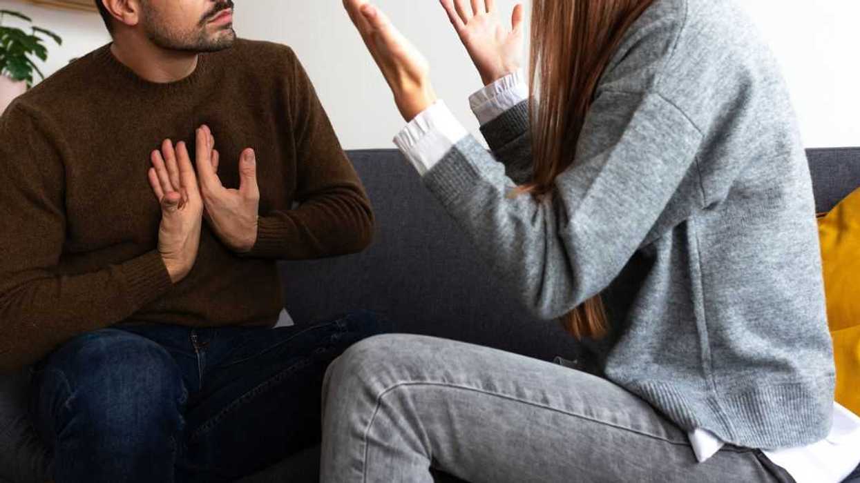 Young couple having an argument. Woman is angry with man.
