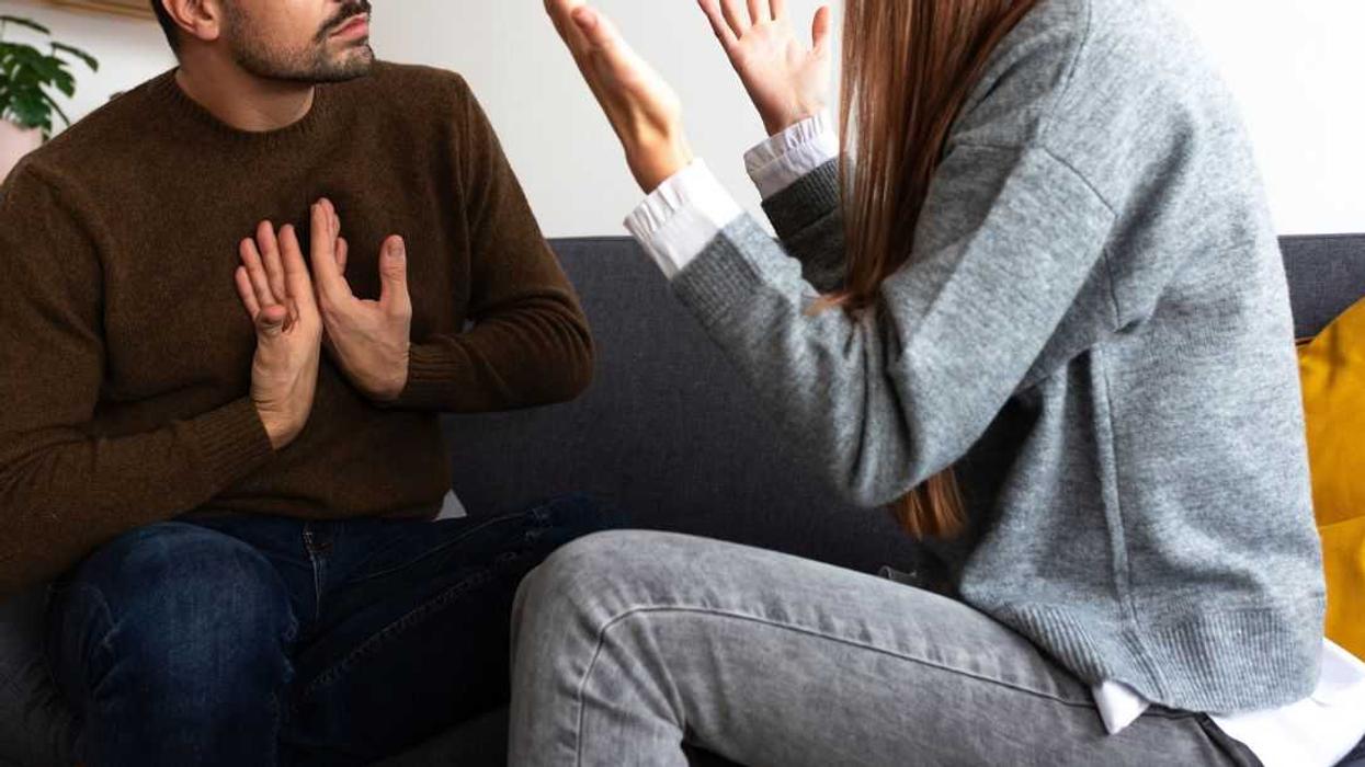 Young couple having an argument. Woman is angry with man.