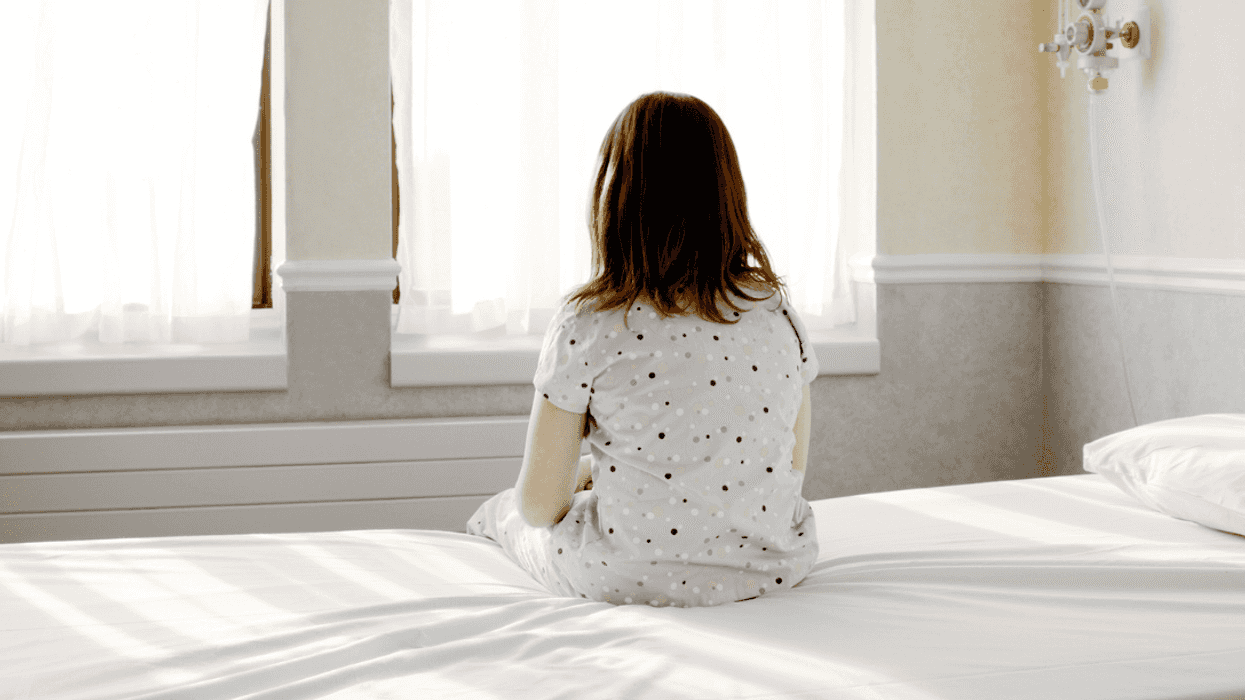 Young girl in hospital bed