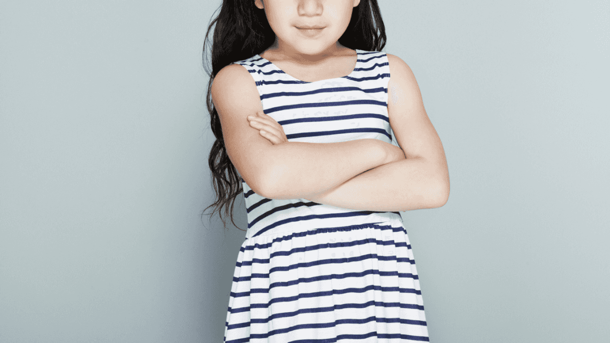 Young girl with her arms crossed