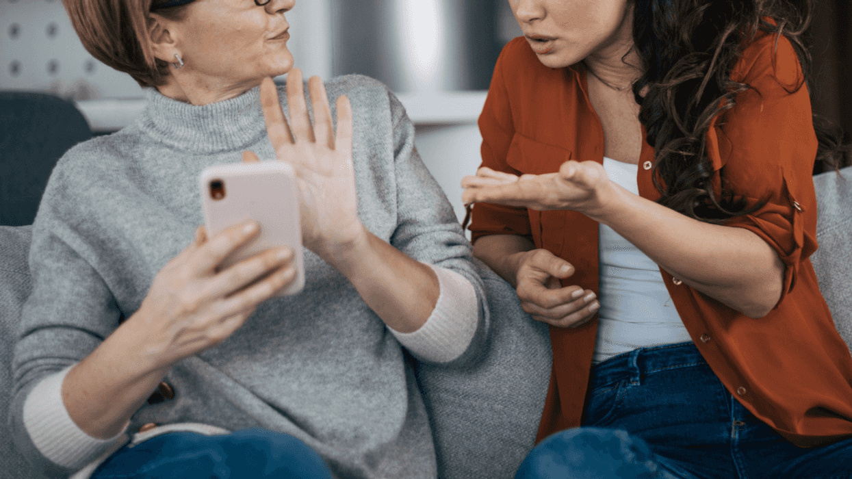 Young woman arguing with older woman