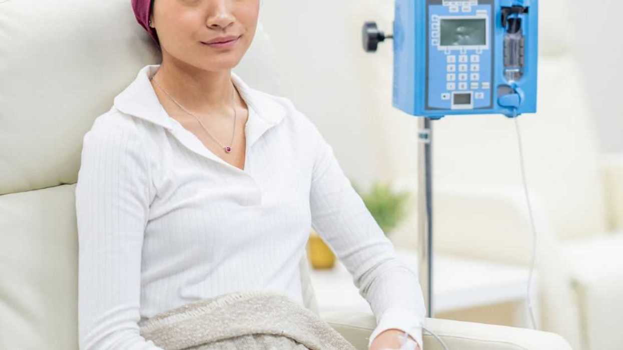 Young woman receiving chemotherapy