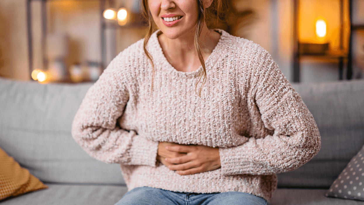 young woman with gastrointestinal distress