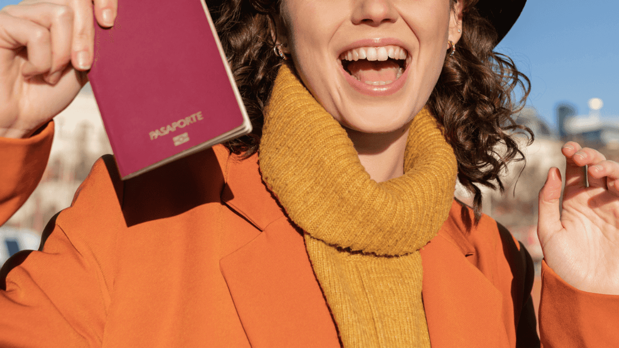 Young woman with passport