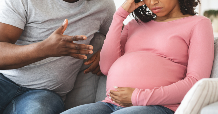Pregnant couple arguing