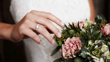 Woman with family heirloom engagement ring