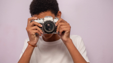 Teenage boy with Camera