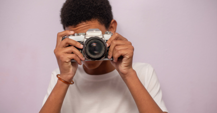 Teenage boy with Camera