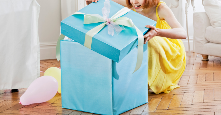 Woman opening gift