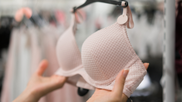 Young woman shopping for bras