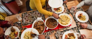 A Bangladeshi family eats a traditional meal