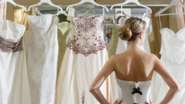 Bride looking at wedding dresses