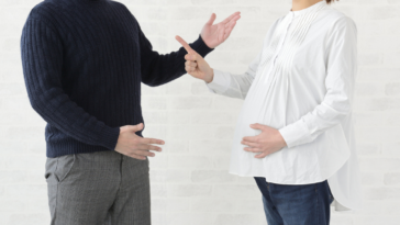 Pregnant woman and husband arguing