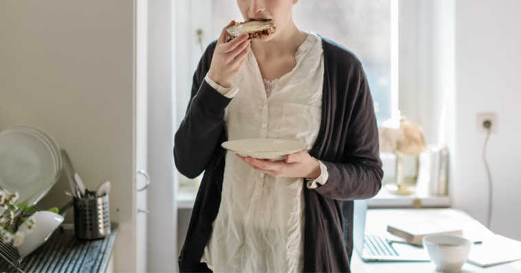 Woman eating toast