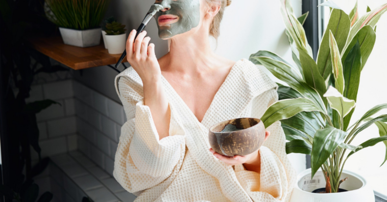 woman in mud mask at spa