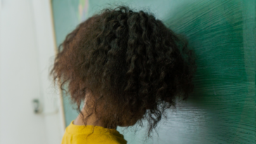 Young girl with curly hair