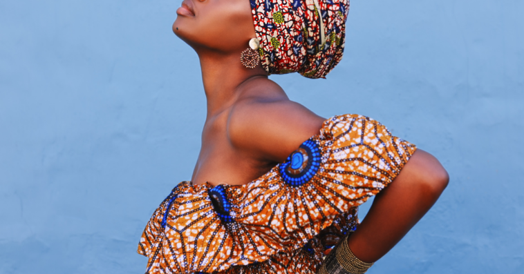 African woman in bright traditional clothing