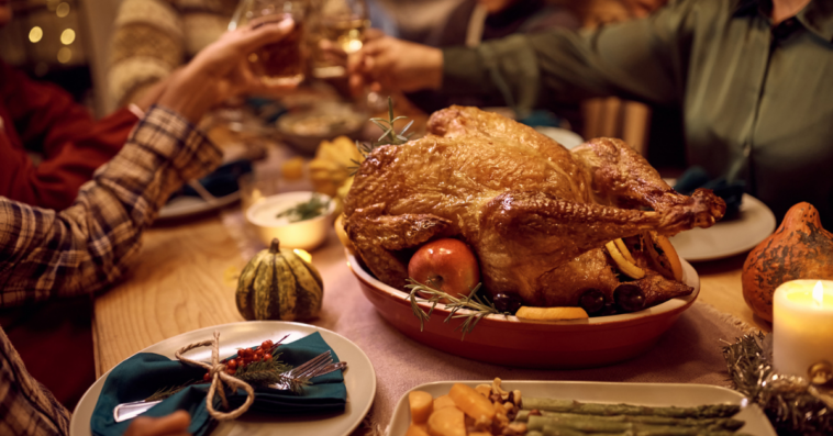 Family enjoying Thanksgiving dinner.