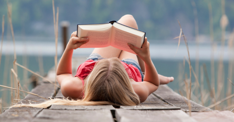 Teen girl reading a book