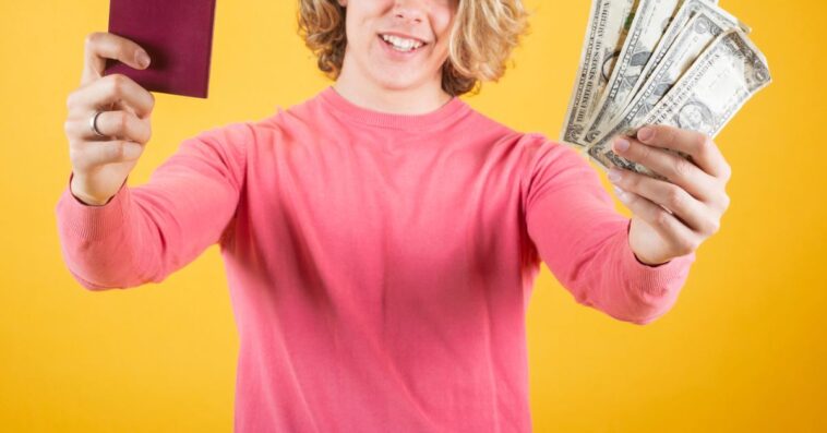Teen holding money