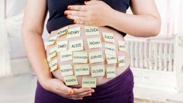 Pregnant woman deciding baby names
