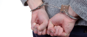 Teenage girl in handcuffs