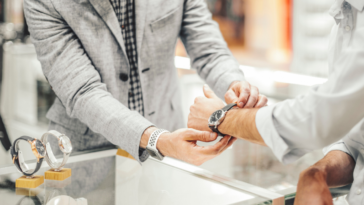 Man looking at expensive watch