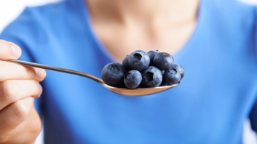 woman with blueberries