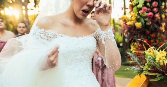 upset bride crying at wedding reception
