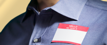 Person wearing a 'Hello, My Name Is' name tag