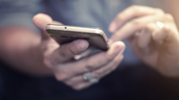 Man looking at his cell phone