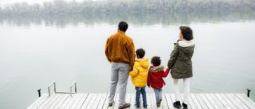 Family overlooking a lake