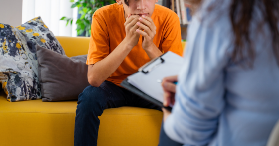 teen boy in therapy session