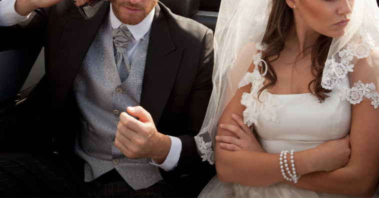 Bride and groom in car