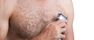 Man shaving chest