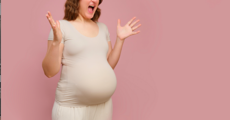 A pregnant woman screaming.