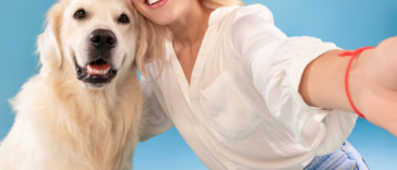 Woman with her adopted golden retriever