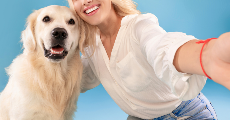 Woman with her adopted golden retriever