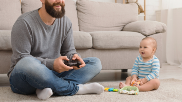 Gamer dad with his baby